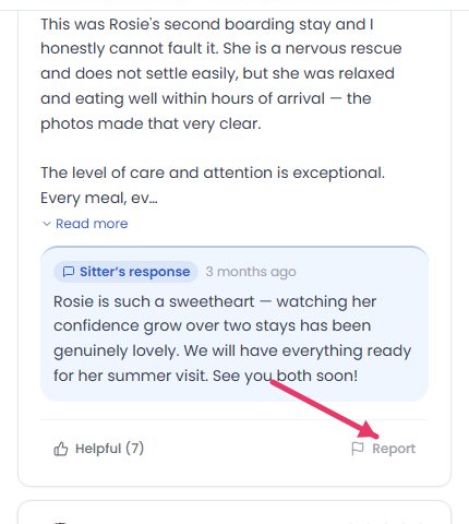 A review card with a red arrow pointing at the Report flag option next to Helpful